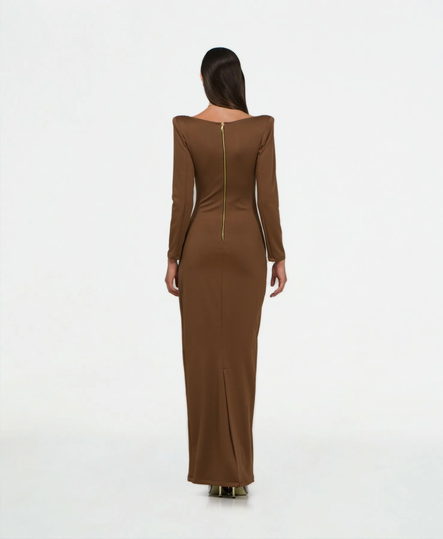 Long brown dress with opening on chest and bow on abdomen, back view