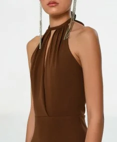 Brown dress with crossed halter neck and details