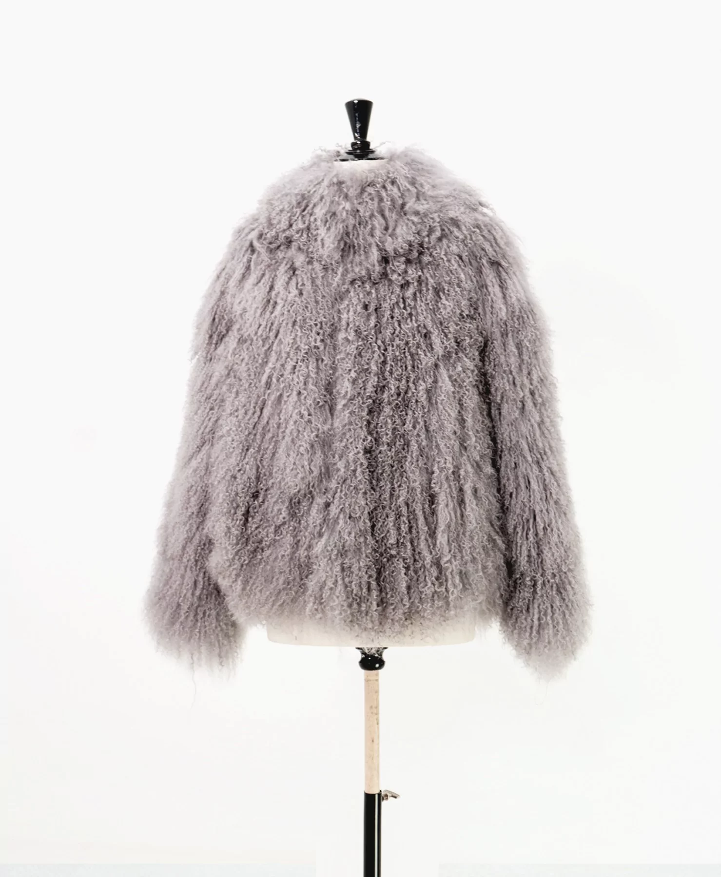 Women's Grey fur coat over manequin