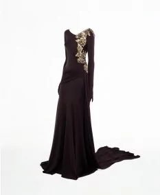 Very elegant brown evening dress on a mannequin.