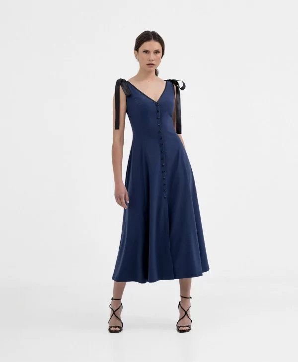 Blue midi dress with buttons and bows Elegant blue design with a V-neckline