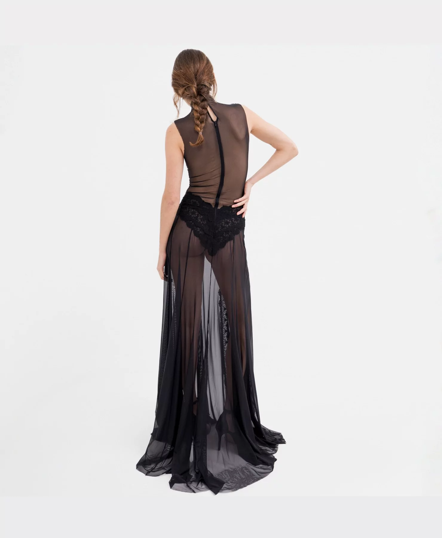 Elegant movement of the Hecate Dress at a rear angle.